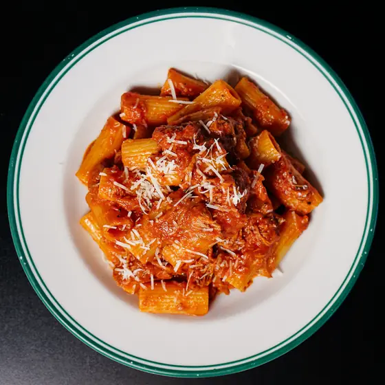 Rigatoni with pork neck ragu and grated pecorino, from above